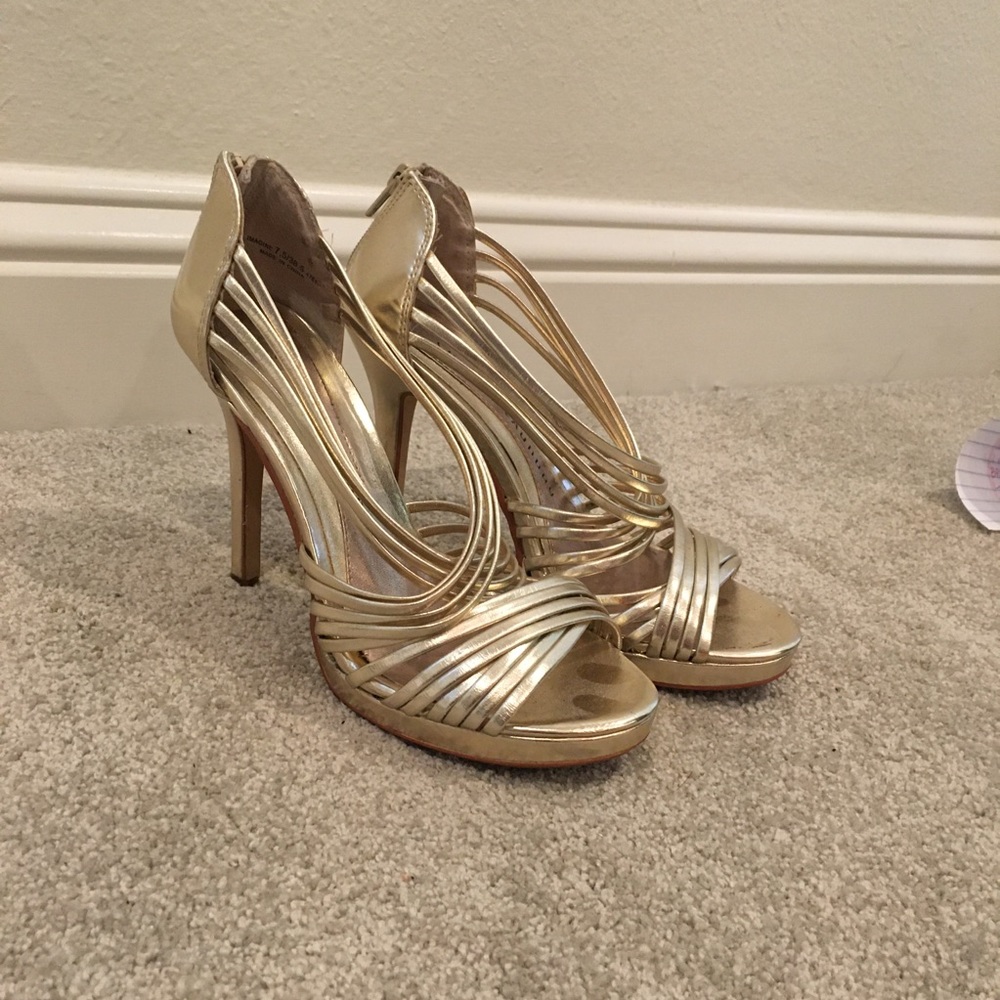 Gold strappy heels